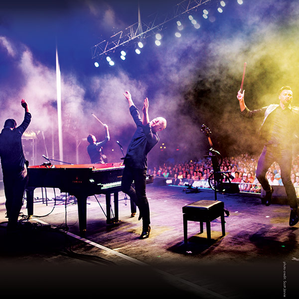 The Piano Guys on stage