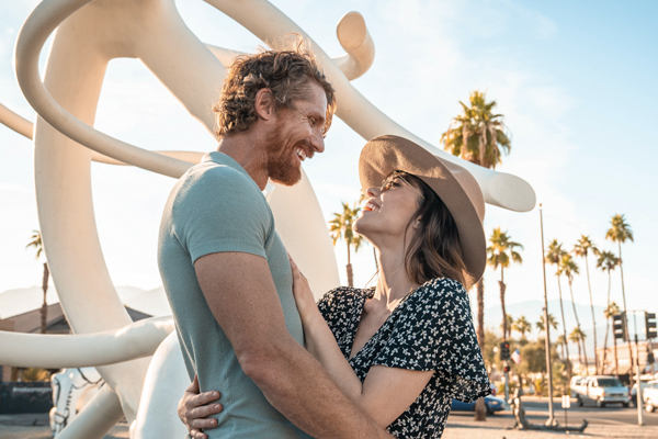 Couple enjoying public art works in Palm Desert, CA