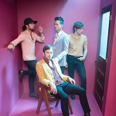 Kings of Leon in a pink room