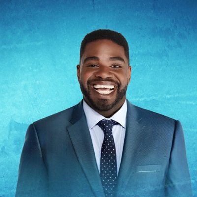 Ron Funches on a blue background