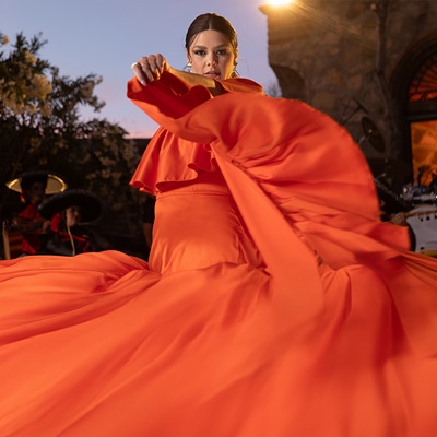 Yuridia with a red dress