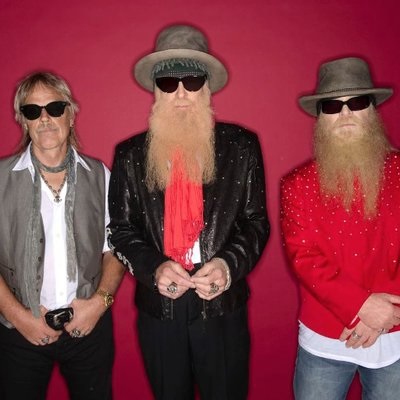 zz top band members on a colored background