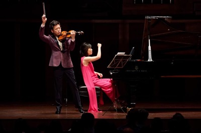 helen and paul huang performing together